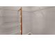 Walk-in closet features built-in shelving and a wooden support at 2857 Brewster Rd, North Port, FL 34288