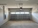 This two-car garage with concrete flooring provides ample parking and storage space at 31901 Anchor Point Dr, Wesley Chapel, FL 33545