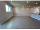 Open-concept living room featuring tile floors and recessed lighting at 31901 Anchor Point Dr, Wesley Chapel, FL 33545