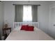 Cozy bedroom with a queen-size bed and nightstand at 4460 95Th N Ave # 1, Pinellas Park, FL 33782