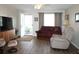Cozy living room featuring hardwood floors and comfortable seating at 4460 95Th N Ave # 1, Pinellas Park, FL 33782