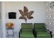 Inviting entryway with seating area and tropical decor at 4460 95Th N Ave # 1, Pinellas Park, FL 33782