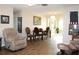 Spacious living room with comfortable seating and hardwood floors at 4460 95Th N Ave # 1, Pinellas Park, FL 33782