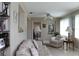 Relaxing living room with sofa, armchair, and decorative accents at 4460 95Th N Ave # 1, Pinellas Park, FL 33782