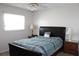 Spacious bedroom with a comfortable bed and nightstands at 4460 95Th N Ave # 1, Pinellas Park, FL 33782