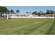 Landscaped community area with lush green grass at 4460 95Th N Ave # 1, Pinellas Park, FL 33782