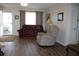 Spacious living room with hardwood floors and comfortable furniture at 4460 95Th N Ave # 1, Pinellas Park, FL 33782