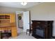 Home office with built-in desk, cabinet and fireplace at 4460 95Th N Ave # 1, Pinellas Park, FL 33782
