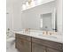 Clean bathroom with double vanity and modern finishes at 408 1/2 E Oak Ave # 5, Tampa, FL 33602