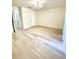 Spacious bedroom with light wood flooring at 7514 Bolanos Ct, Tampa, FL 33615