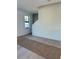 Bright living room with hardwood floors and large window at 1302 E Kay St # 1, Tampa, FL 33602