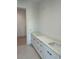 Bathroom with double vanity and marble countertops at 1302 E Kay St # 1, Tampa, FL 33602