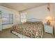Spacious main bedroom with king-size bed and ensuite bathroom at 12760 Indian Rocks Rd # 1071, Largo, FL 33774