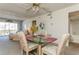 Bright dining area with glass-top table and four chairs at 12760 Indian Rocks Rd # 1071, Largo, FL 33774