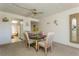 Bright dining room featuring a glass-top table and four chairs at 12760 Indian Rocks Rd # 1071, Largo, FL 33774