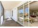 Screened balcony with partial view and table at 12760 Indian Rocks Rd # 1071, Largo, FL 33774