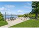 Relaxing waterfront patio with seating and picnic tables at 12760 Indian Rocks Rd # 1071, Largo, FL 33774