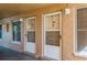 Building entrance with multiple doors and windows at 12760 Indian Rocks Rd # 1071, Largo, FL 33774