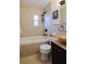 Bathroom features a soaking tub and vessel sink at 10931 Clara Ln, St Petersburg, FL 33708