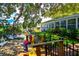 Wooden dock with metal railing, offering waterfront access at 10931 Clara Ln, St Petersburg, FL 33708