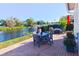 Relaxing patio overlooking the canal, perfect for outdoor dining at 10931 Clara Ln, St Petersburg, FL 33708