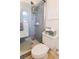 Bathroom with a shower/tub combo and pedestal sink at 10931 Clara Ln, St Petersburg, FL 33708