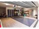 Spacious garage with built-in storage cabinets and epoxy flooring at 10931 Clara Ln, St Petersburg, FL 33708