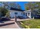 Brick patio with seating area and access to the water at 10931 Clara Ln, St Petersburg, FL 33708
