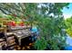 Wooden deck extending over the water, providing serene waterfront views at 10931 Clara Ln, St Petersburg, FL 33708