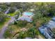 Aerial view showing community pool, tennis court, and playground at 2101 Fox Chase Blvd # 106, Palm Harbor, FL 34683