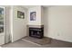 Brick fireplace in living room at 2101 Fox Chase Blvd # 106, Palm Harbor, FL 34683