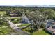 Two-story house with a three-car garage and well-maintained lawn on a quiet street at 8378 Gibralter St, Spring Hill, FL 34608