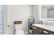 Clean bathroom with updated vanity, a large mirror, and a shower/tub combo at 8378 Gibralter St, Spring Hill, FL 34608