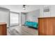 Bedroom with twin bed, dresser, and hardwood floors at 8378 Gibralter St, Spring Hill, FL 34608