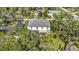 Aerial view of a two-story house with a backyard pool at 8378 Gibralter St, Spring Hill, FL 34608