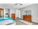 Bedroom with double bed, dresser, and hardwood floors at 8378 Gibralter St, Spring Hill, FL 34608