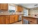 Kitchen with sink, stainless steel appliances, and wood cabinets at 8378 Gibralter St, Spring Hill, FL 34608