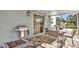 Relaxing screened patio with outdoor seating and grill at 8378 Gibralter St, Spring Hill, FL 34608