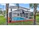 Large screened-in pool with surrounding patio and landscaping at 8378 Gibralter St, Spring Hill, FL 34608