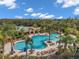 Relaxing community pool with plenty of lounge chairs at 10433 Canary Isle Dr, Tampa, FL 33647