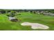 Golf course community with houses and pond at 10520 Collar Dr, San Antonio, FL 33576