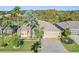 Single-Gathering home with a large backyard and lush landscaping at 10520 Collar Dr, San Antonio, FL 33576
