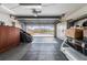 Spacious garage with tiled floor and room for storage at 10520 Collar Dr, San Antonio, FL 33576