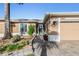 Inviting exterior with landscaped yard and attached garage at 10520 Collar Dr, San Antonio, FL 33576