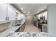 Modern kitchen with granite countertops and stainless steel appliances at 10520 Collar Dr, San Antonio, FL 33576