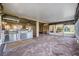 Relaxing outdoor patio with built-in stainless steel grill at 10520 Collar Dr, San Antonio, FL 33576