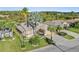 Single-Gathering home with landscaped yard and driveway at 10520 Collar Dr, San Antonio, FL 33576
