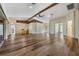 Spacious living room with hardwood floors and high ceilings at 10520 Collar Dr, San Antonio, FL 33576