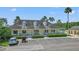 Community clubhouse with ample parking at 10520 Collar Dr, San Antonio, FL 33576