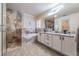 Elegant bathroom with a soaking tub, walk-in shower, and double vanity at 10520 Collar Dr, San Antonio, FL 33576
